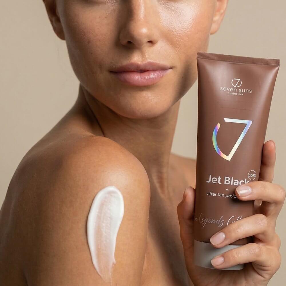 Close-up of woman applying 7suns Jet Black after tan lotion cream