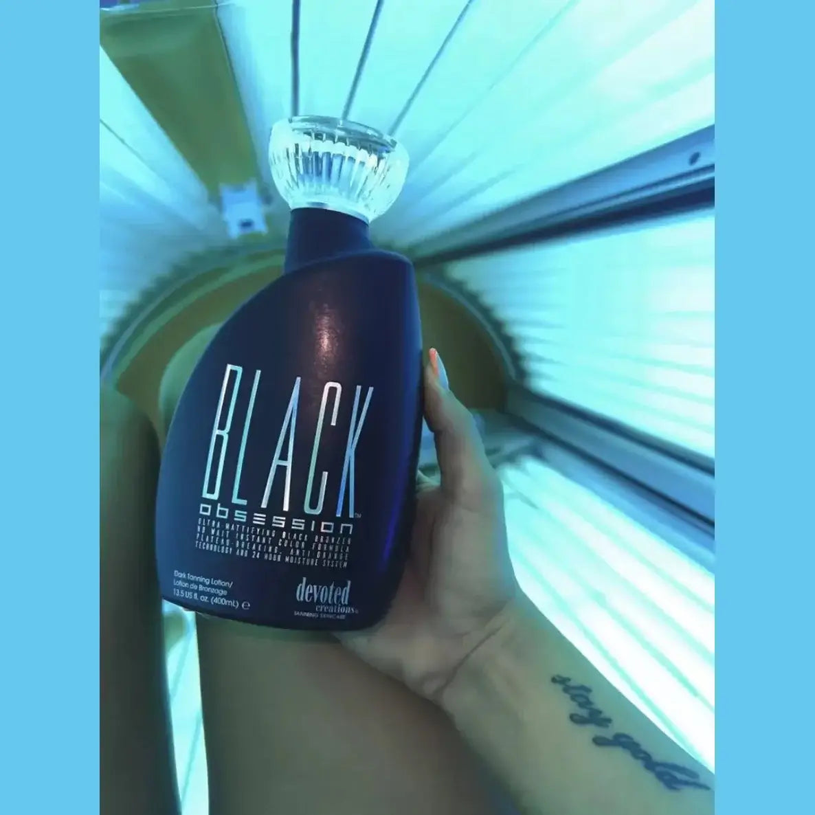 Cream for solarium Devoted Creations Black Obsession, Ultra-Mattifying Black Tan Lotion, Instant Color Formula, 400 ml