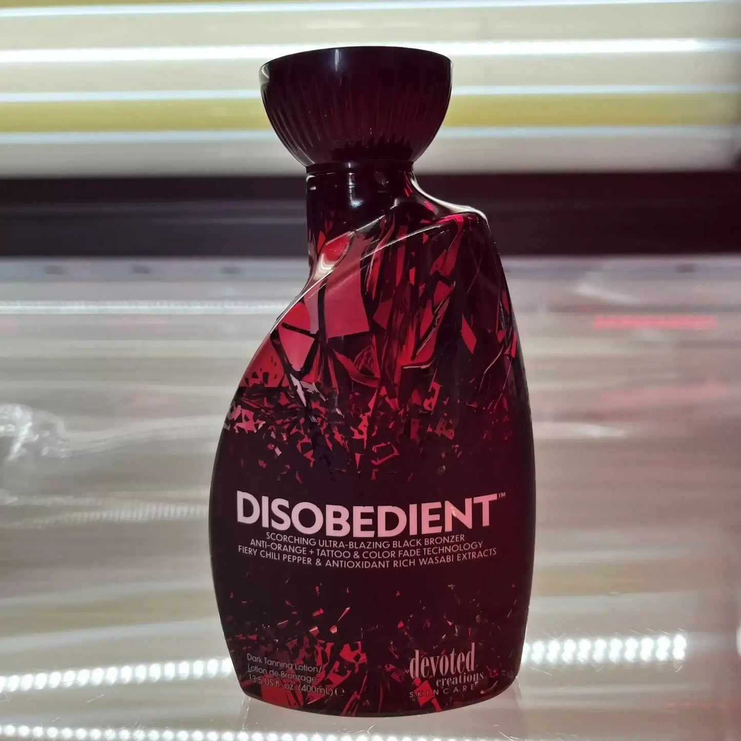 Cream for solarium Devoted Creations Disobedient, Ultra-Blazing Black Tan Lotion with chili pepper and wasabi extracts, 400 ml