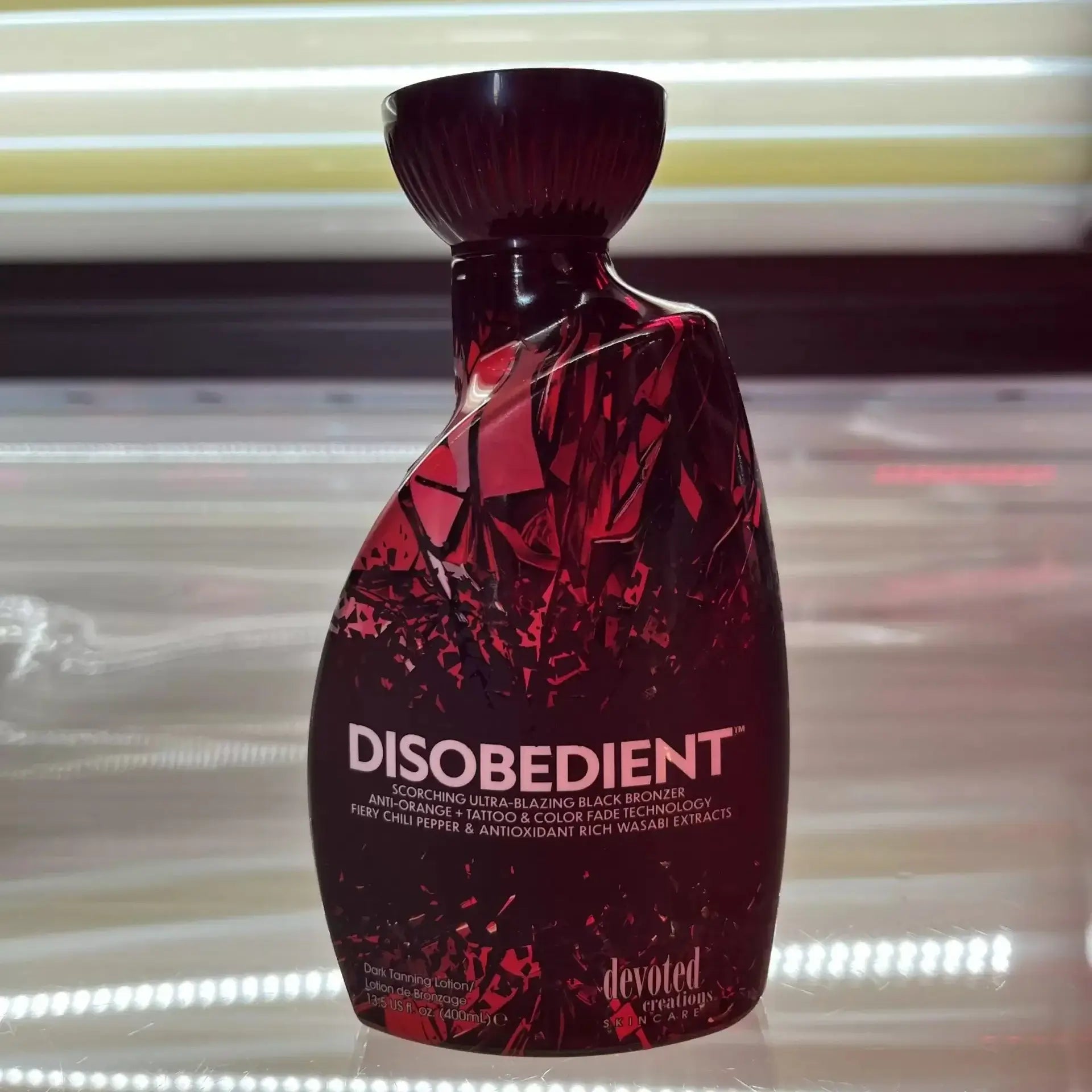 Cream for solarium Devoted Creations Disobedient, Ultra-Blazing Black Tan Lotion with chili pepper and wasabi extracts, 400 ml
