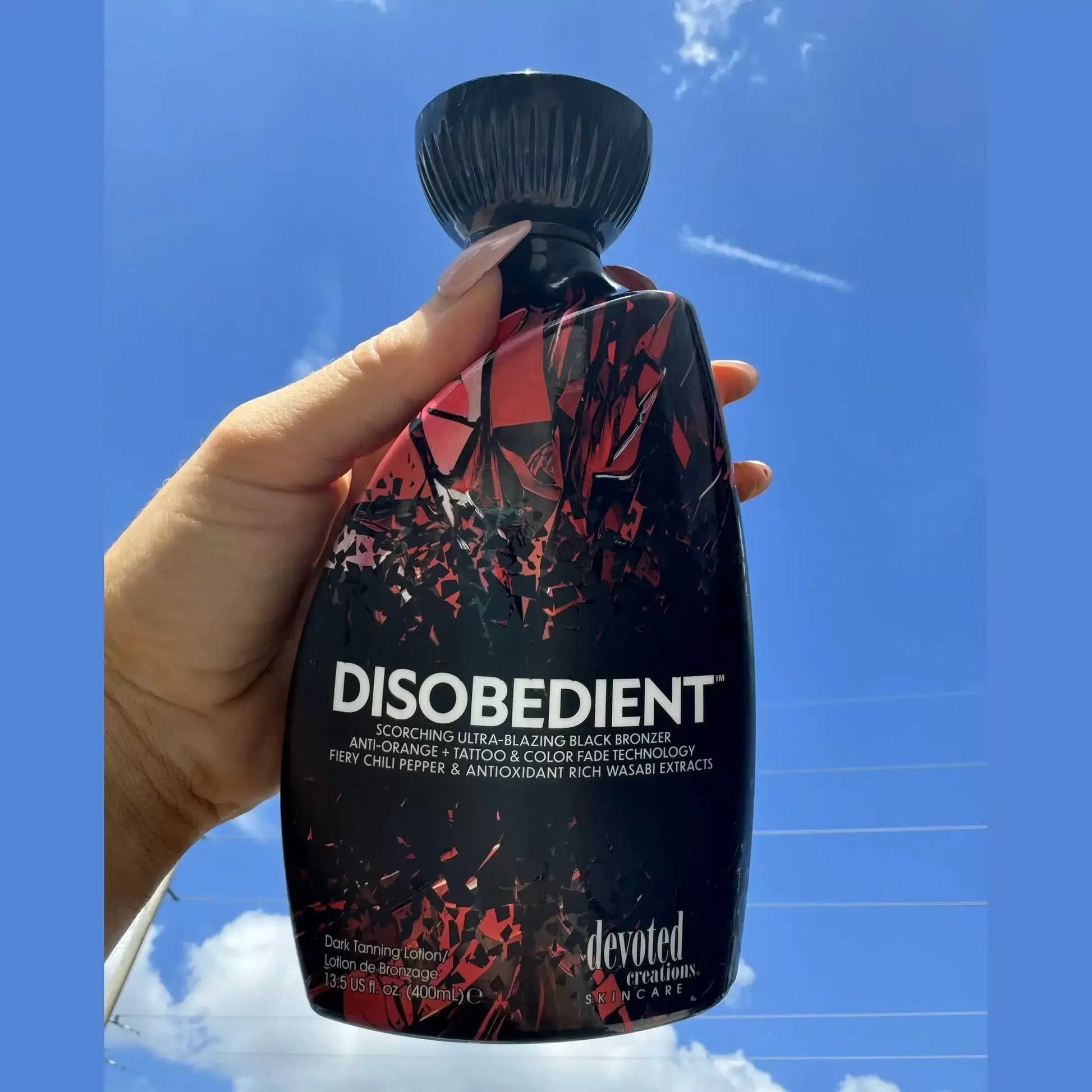Cream for solarium Devoted Creations Disobedient, Ultra-Blazing Black Tan Lotion with chili pepper and wasabi extracts, 400 ml
