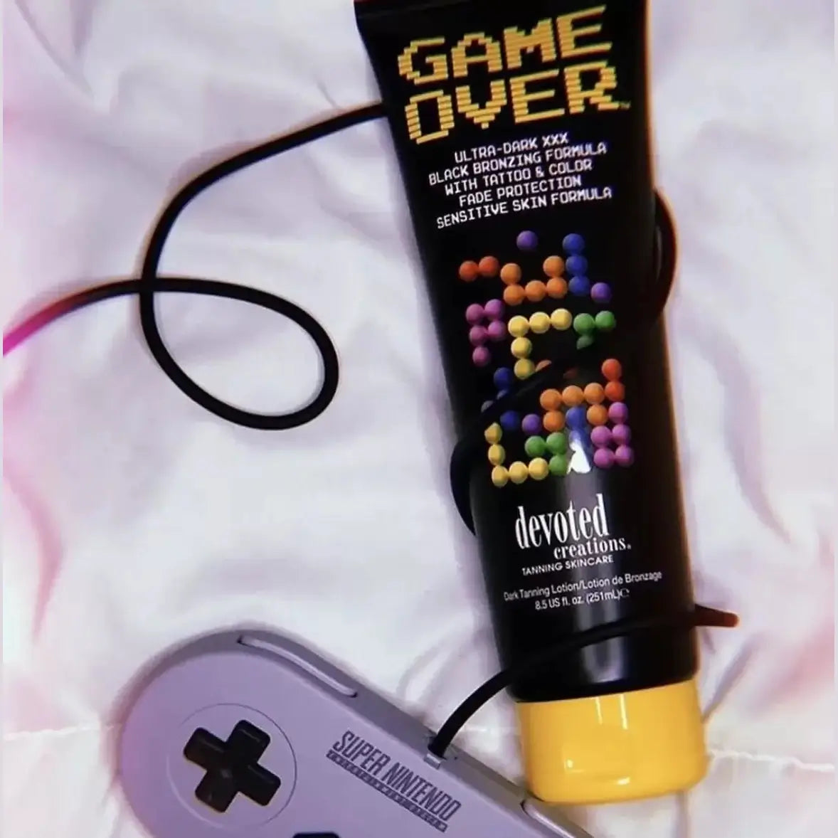 Cream for solarium Devoted Creations Game Over, for ultra-dark tan, with cocoa, shea butter, sensitive skin formula, 251 ml