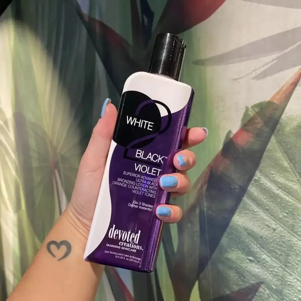 Cream for solarium Devoted Creations White 2 Black Violet Ultra-Black Tan Lotion with orange counteracting violet tones, 251 ml