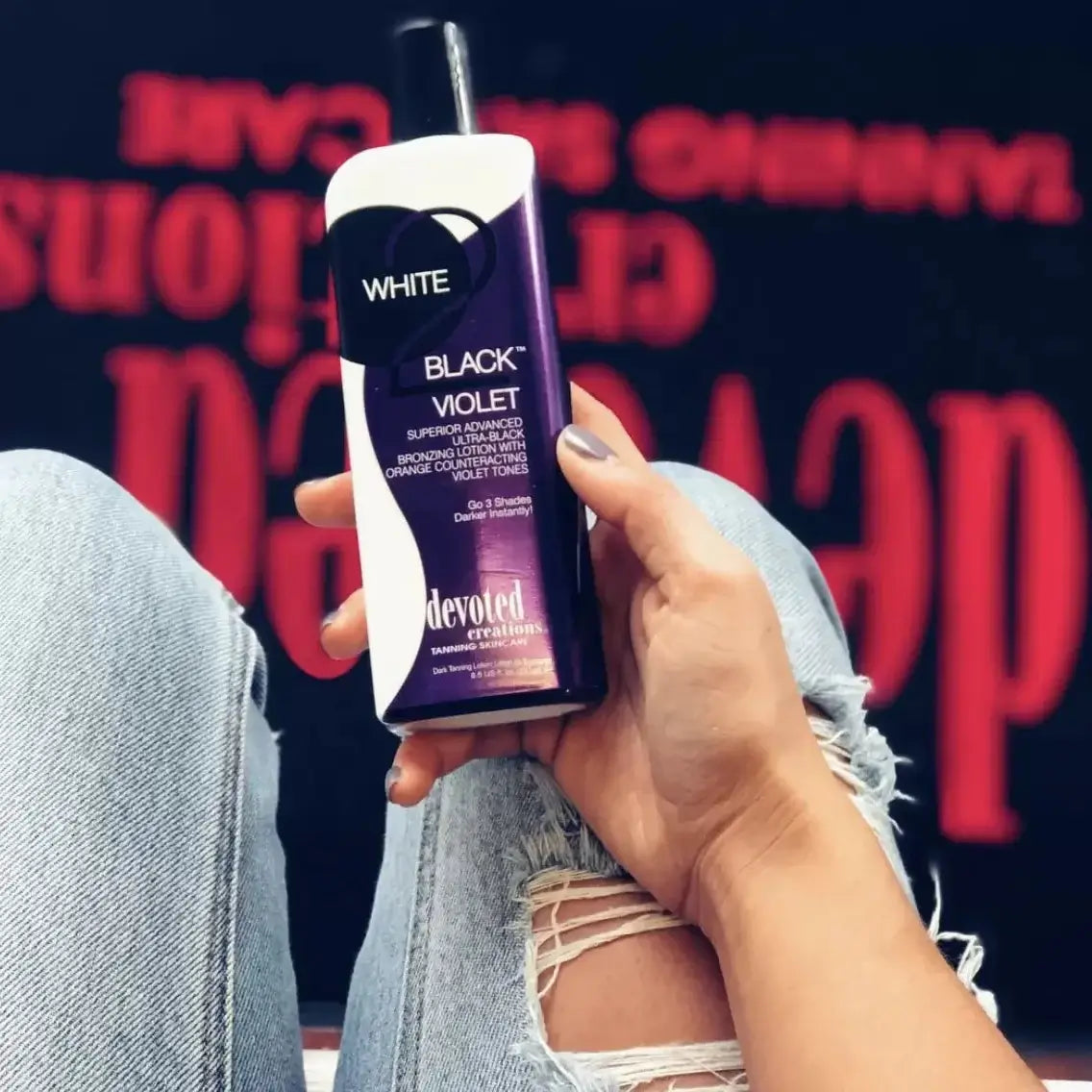 Cream for solarium Devoted Creations White 2 Black Violet Ultra-Black Tan Lotion with orange counteracting violet tones, 251 ml