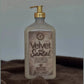 Velvet and Santal ultra rich moisturizer on dark brown plush fabric highlighting Cupuaçu Butter
