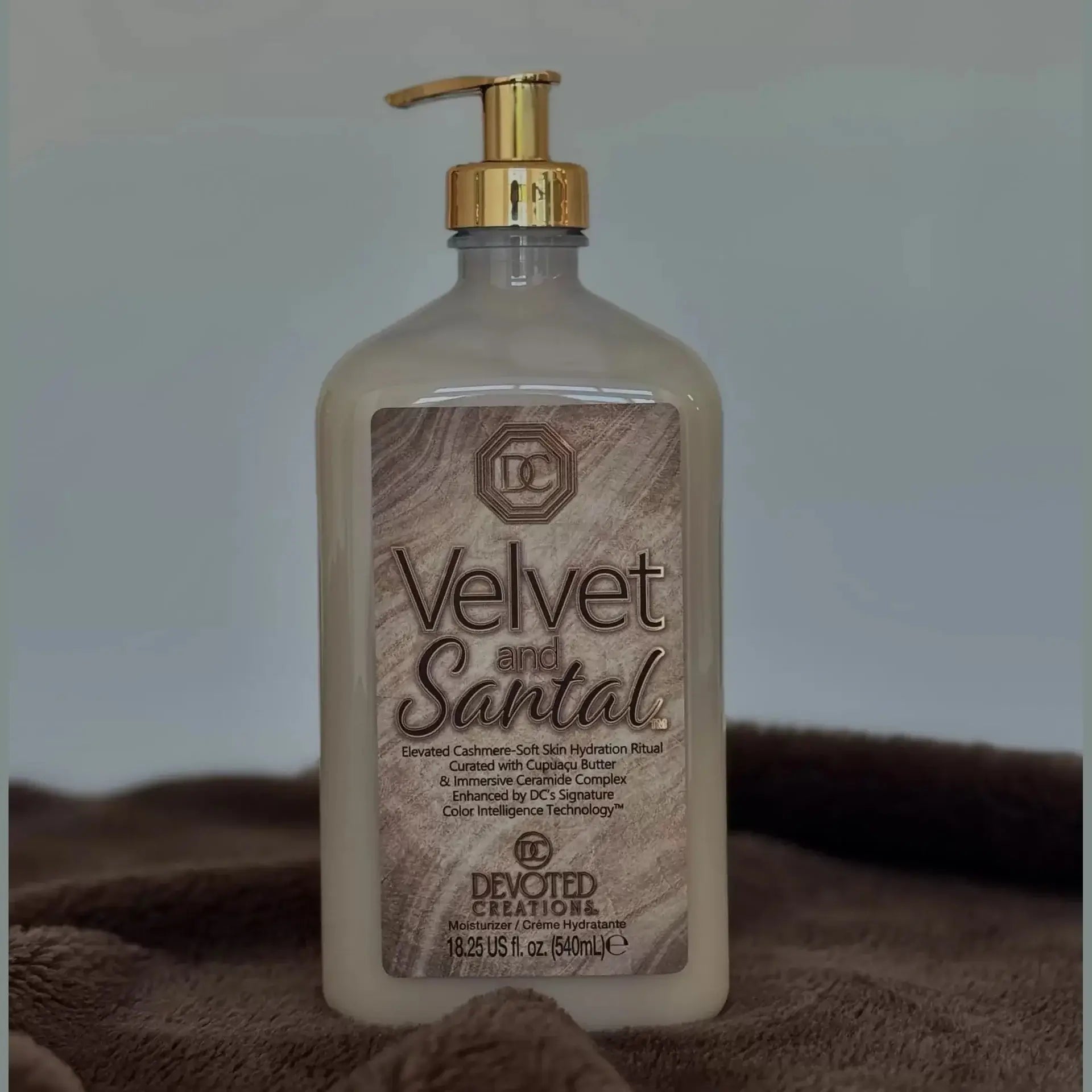Velvet and Santal ultra rich moisturizer on dark brown plush fabric highlighting Cupuaçu Butter
