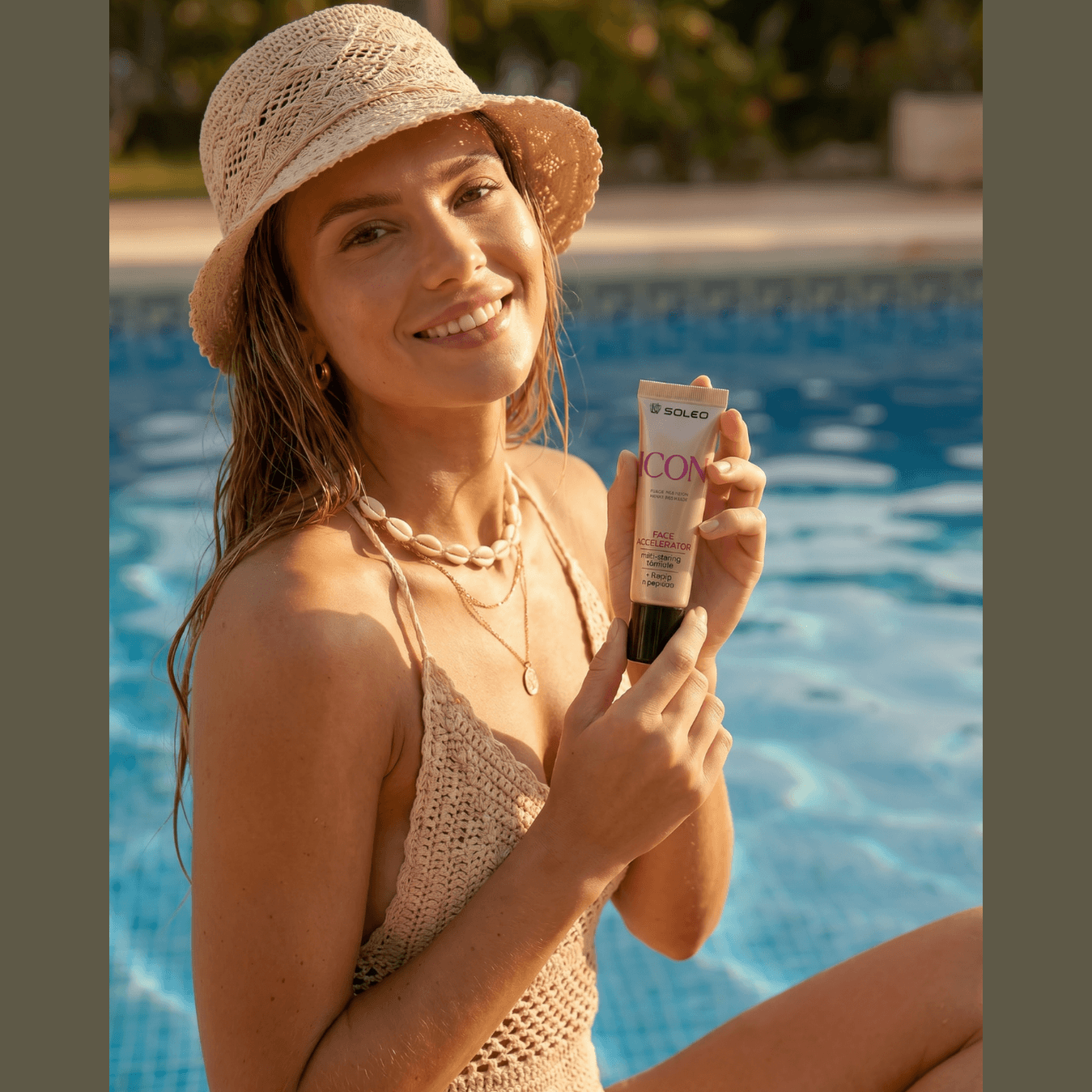 Woman holding Soleo Icon Face Accelerator tube by pool, gold bottle with hemp and peptide formula