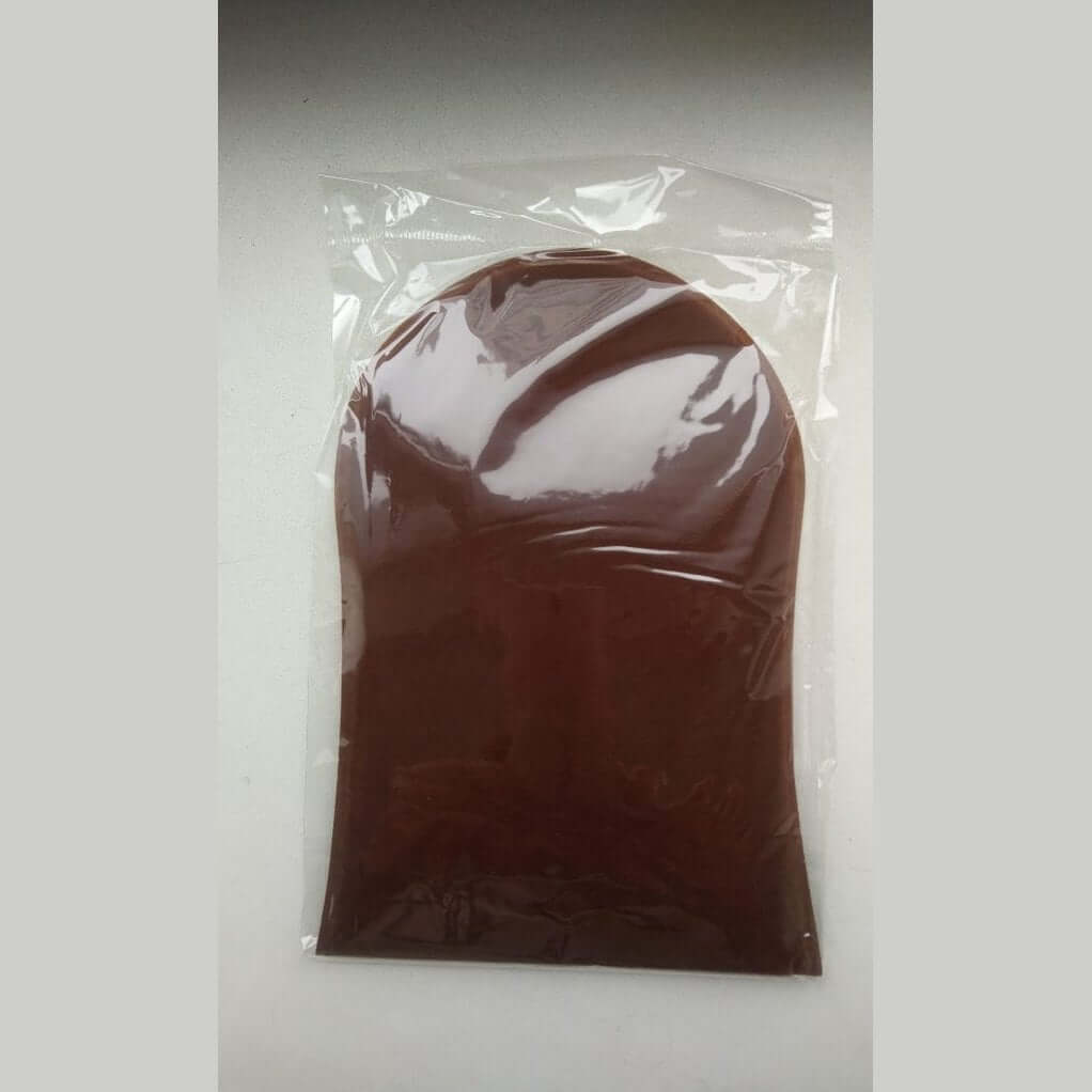 Suntana brown self-tan mitt in clear retail packaging bag